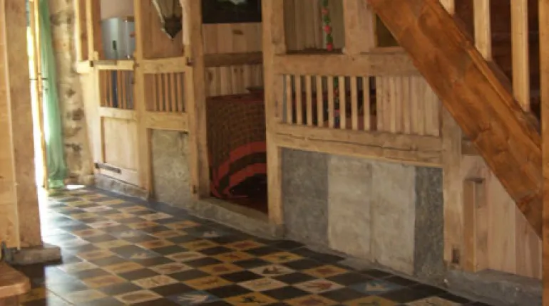 Typical tiles and wooden staircase Grange de Bâa Hautes Pyrénées